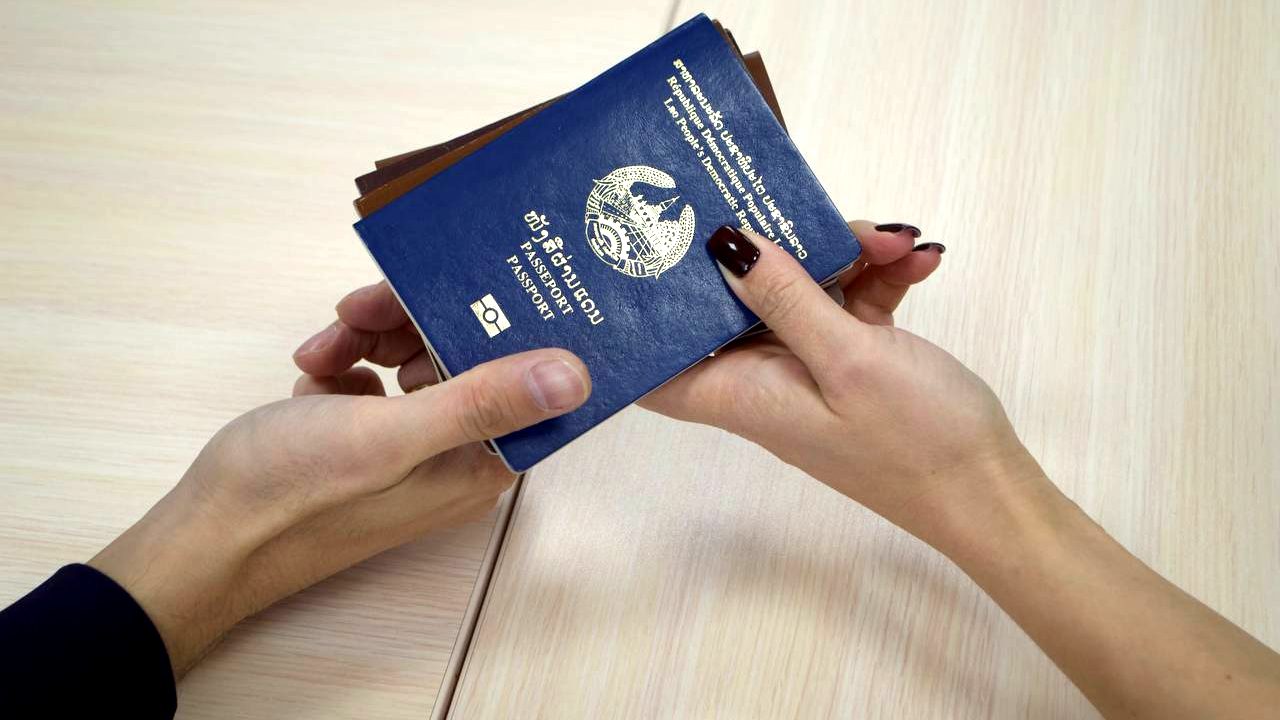 Foreign workers' passports in the hands of a Workmigration specialist